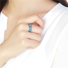 Load image into Gallery viewer, Light Blue Four-Crystal Halo Ring – Black Stainless Steel | March Birthstone